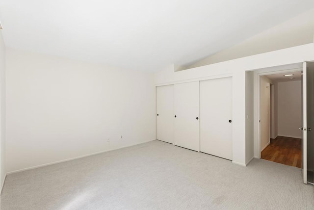 2009 Pointer Gln, Escondido, CA 92029 - unfurnished bedroom with light colored carpet, vaulted ceiling, and a closet