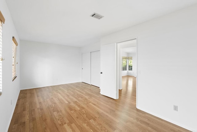 2009 Pointer Gln, Escondido, CA 92029 - unfurnished bedroom with light wood-type flooring and a closet