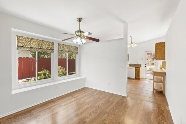 2009 Pointer Gln, Escondido, CA 92029 - empty room featuring a chandelier, a ceiling fan, and wood finished floors