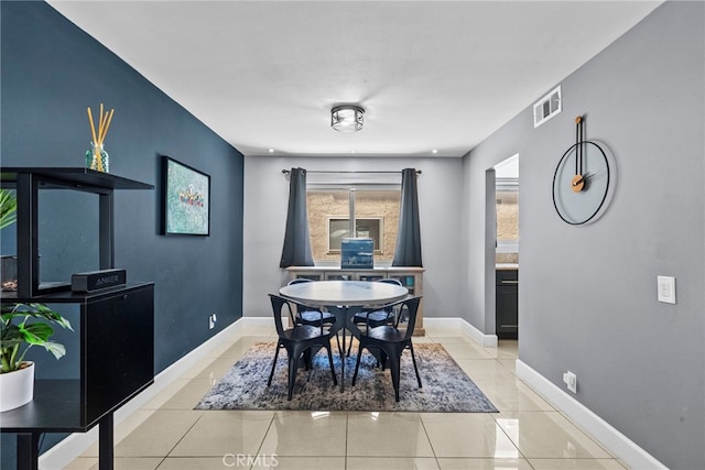10155 De Soto Ave Unit 104, Chatsworth, CA 91311 - dining room featuring light tile patterned floors and baseboards