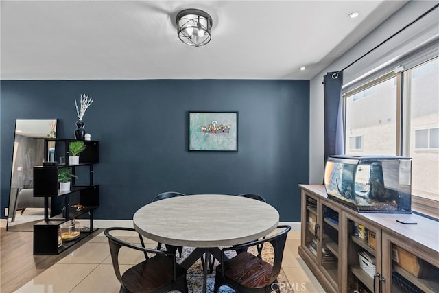 10155 De Soto Ave Unit 104, Chatsworth, CA 91311 - dining space featuring light tile patterned floors, an accent wall, and recessed lighting