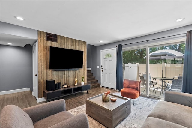 10155 De Soto Ave Unit 104, Chatsworth, CA 91311 - living room featuring wood finished floors, stairway, and recessed lighting