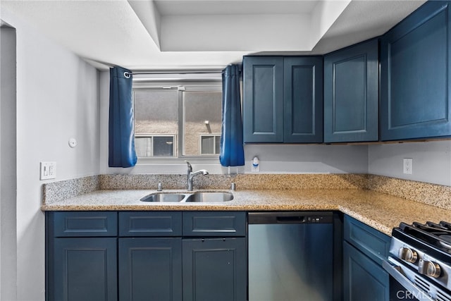 10155 De Soto Ave Unit 104, Chatsworth, CA 91311 - kitchen featuring dishwashing machine, light countertops, and blue cabinets