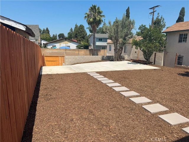 315 S Walnut Ave, Placentia, CA 92870 - fenced backyard featuring a patio area