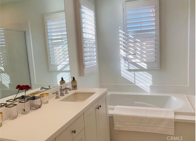 111 Omar, Irvine, CA 92620 - bathroom featuring plenty of natural light, a bath, vanity, and an enclosed shower