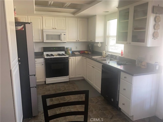 8978 Broken Spur Rd, Pinon Hills, CA 92372 - kitchen featuring white appliances, white cabinetry, glass insert cabinets, and light countertops