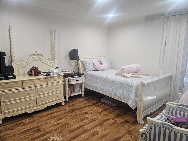 8601 International Ave Unit 266, Canoga Park, CA 91304 - bedroom with dark wood finished floors and ornamental molding