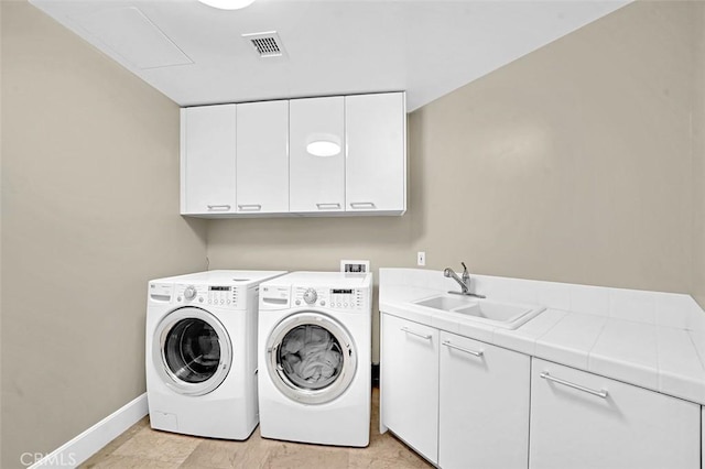5124 Scholarship Unit 1007, Irvine, CA 92612 - laundry room featuring cabinet space and washer and dryer