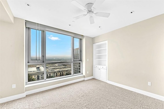 5124 Scholarship Unit 1007, Irvine, CA 92612 - carpeted spare room featuring baseboards and ceiling fan