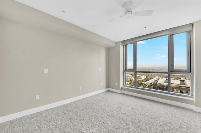 5124 Scholarship Unit 1007, Irvine, CA 92612 - carpeted spare room with baseboards and a ceiling fan