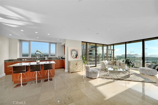 5124 Scholarship Unit 1007, Irvine, CA 92612 - living room with recessed lighting and floor to ceiling windows