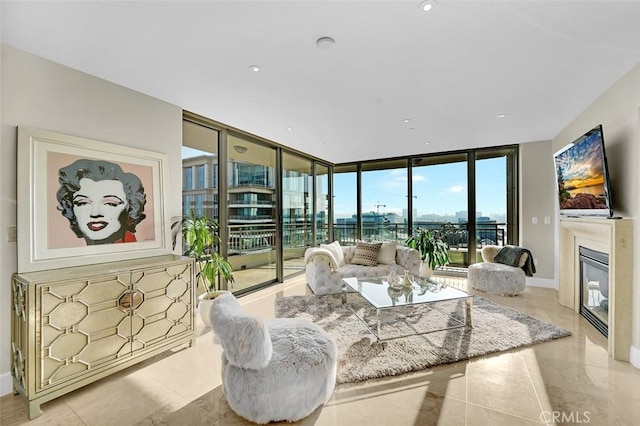 5124 Scholarship Unit 1007, Irvine, CA 92612 - living area with a wall of windows, a glass covered fireplace, and light tile patterned flooring