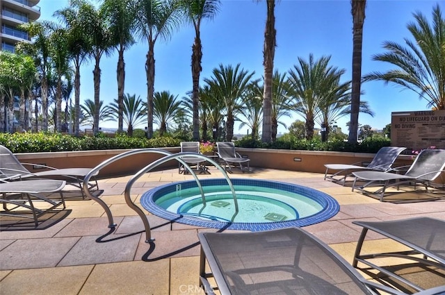 5124 Scholarship Unit 1007, Irvine, CA 92612 - view of pool featuring a community hot tub and a patio area