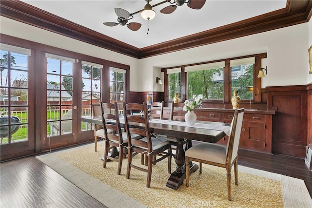 3354 Orange St, Riverside, CA 92501 - dining space featuring crown molding, a wainscoted wall, ceiling fan, and wood finished floors