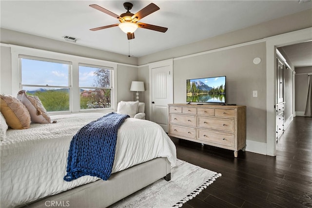 3354 Orange St, Riverside, CA 92501 - bedroom featuring dark wood-style floors, a ceiling fan, and attic access