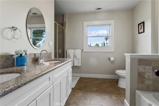 3354 Orange St, Riverside, CA 92501 - full bathroom with double vanity, an enclosed shower, healthy amount of natural light, and a tub