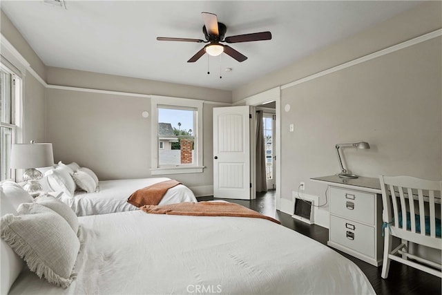 3354 Orange St, Riverside, CA 92501 - bedroom featuring dark wood-style floors and ceiling fan