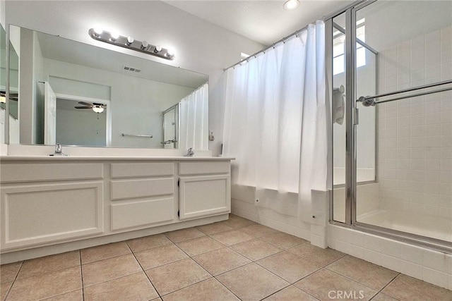 25401 Holly Beach Dr, Saugus, CA 91350 - full bath with tile patterned flooring, a shower with shower curtain, ceiling fan, double vanity, and recessed lighting