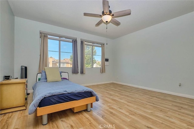 25401 Holly Beach Dr, Saugus, CA 91350 - bedroom featuring light wood finished floors and ceiling fan