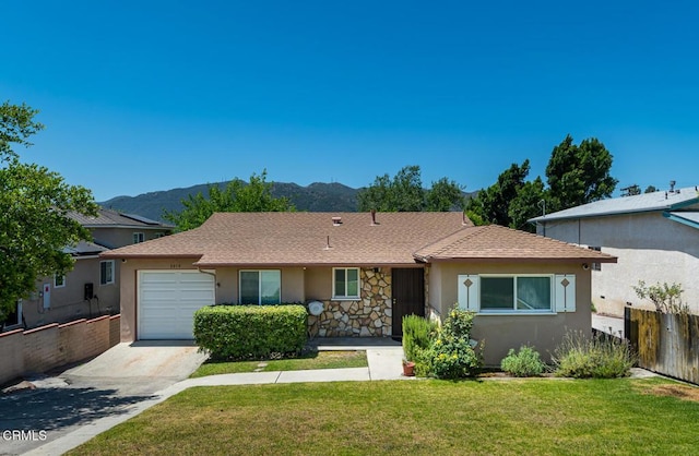 3910 Vista Ct, La Crescenta, CA 91214 - ranch-style home featuring stucco siding, a garage, driveway, a mountain view, and stone siding