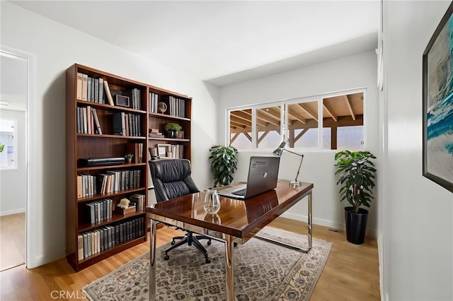 1410 Gulf Ave, Wilmington, CA 90744 - home office with light wood-style floors