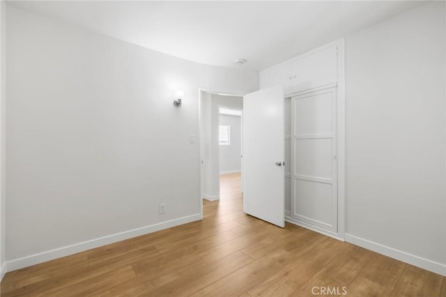 1410 Gulf Ave, Wilmington, CA 90744 - empty room featuring light wood-style floors and baseboards