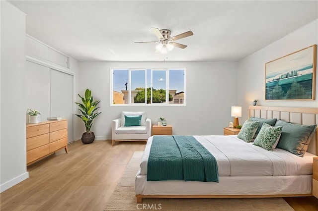 1410 Gulf Ave, Wilmington, CA 90744 - bedroom featuring wood finished floors, a closet, and a ceiling fan