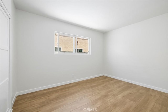 1410 Gulf Ave, Wilmington, CA 90744 - spare room with light wood finished floors and baseboards