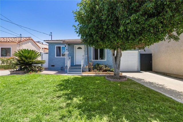 1410 Gulf Ave, Wilmington, CA 90744 - view of front of property featuring stucco siding, driveway, a front lawn, and a garage