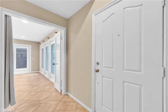 284 Tustin Field Dr, Tustin, CA 92782 - foyer with light tile patterned flooring and baseboards