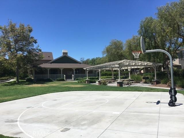 284 Tustin Field Dr, Tustin, CA 92782 - view of basketball court featuring community basketball court and a lawn