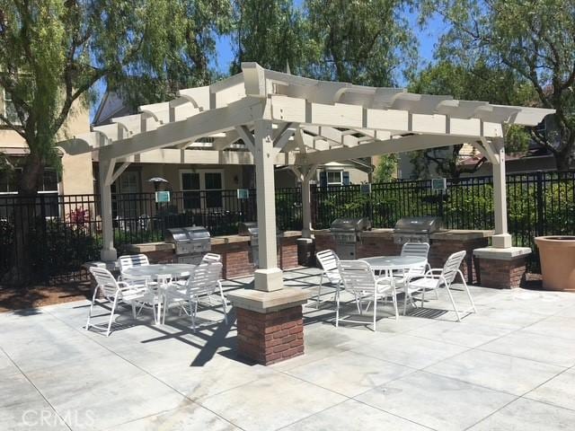 284 Tustin Field Dr, Tustin, CA 92782 - view of patio / terrace featuring outdoor dining space, area for grilling, and a pergola