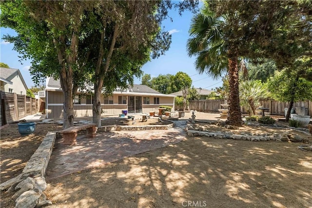 7021 Shoshone Ave, Lake Balboa, CA 91406 - fenced backyard featuring a patio