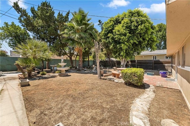 7021 Shoshone Ave, Lake Balboa, CA 91406 - fenced backyard featuring a patio