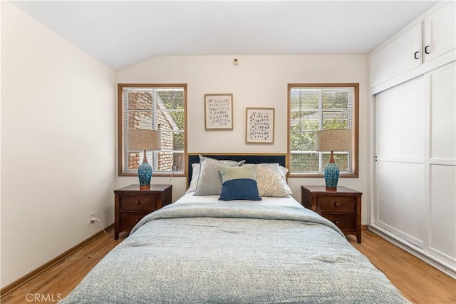 7021 Shoshone Ave, Lake Balboa, CA 91406 - bedroom with light wood finished floors and lofted ceiling