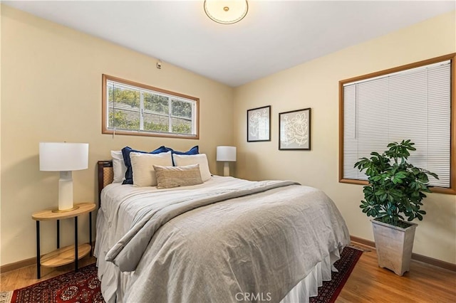 7021 Shoshone Ave, Lake Balboa, CA 91406 - bedroom featuring wood finished floors and baseboards