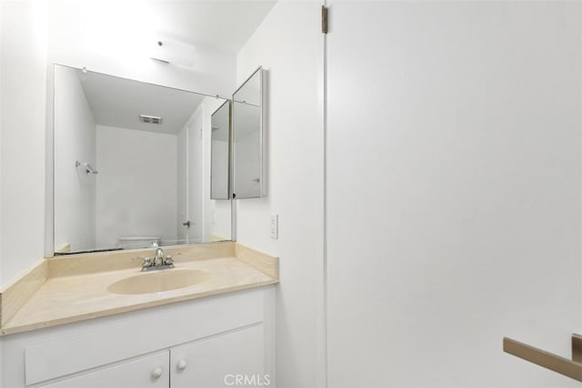 6150 Montecito Dr Unit 6, Palm Springs, CA 92264 - bathroom featuring vanity and toilet