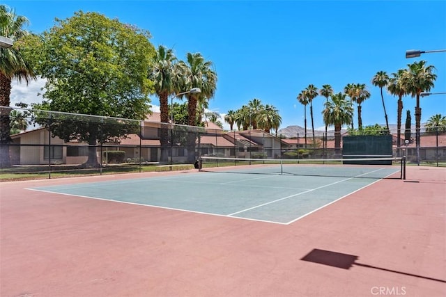 6150 Montecito Dr Unit 6, Palm Springs, CA 92264 - view of tennis court featuring community basketball court