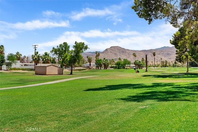6150 Montecito Dr Unit 6, Palm Springs, CA 92264 - view of home's community featuring a mountain view, a yard, and view of golf course