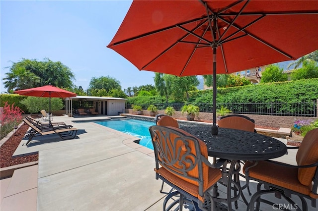 9430 Valley View St, Rancho Cucamonga, CA 91737 - view of swimming pool with a fenced backyard, a patio, and outdoor dining space