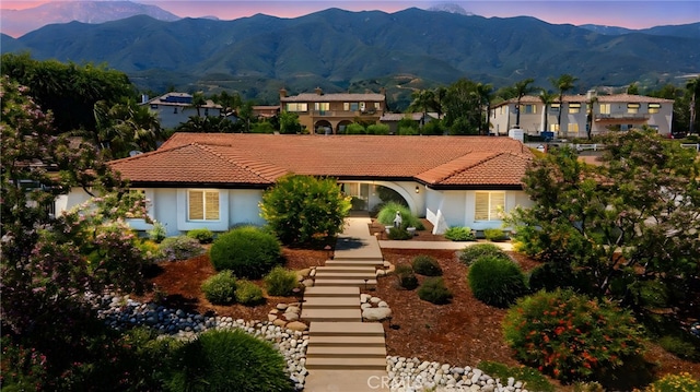 9430 Valley View St, Rancho Cucamonga, CA 91737 - mediterranean / spanish-style house with a mountain view, a tile roof, and stucco siding