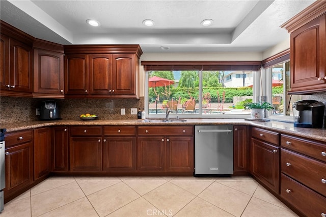 9430 Valley View St, Rancho Cucamonga, CA 91737 - kitchen featuring a raised ceiling, light tile patterned flooring, backsplash, plenty of natural light, and recessed lighting