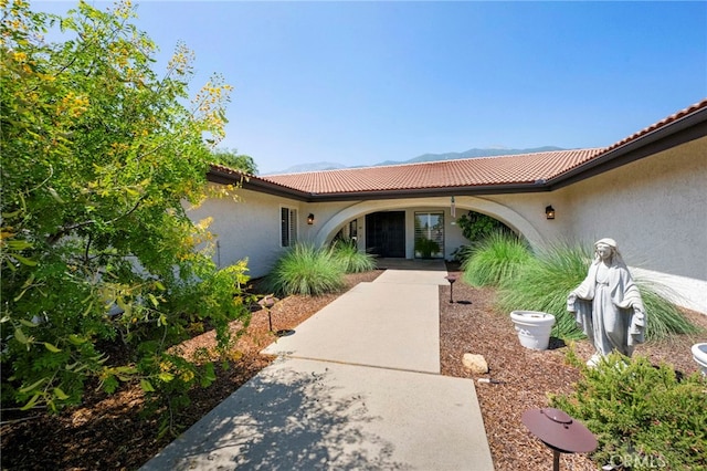 9430 Valley View St, Rancho Cucamonga, CA 91737 - view of exterior entry featuring stucco siding and a tiled roof