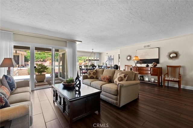 9430 Valley View St, Rancho Cucamonga, CA 91737 - living room featuring plenty of natural light, a chandelier, wood finished floors, and a textured ceiling