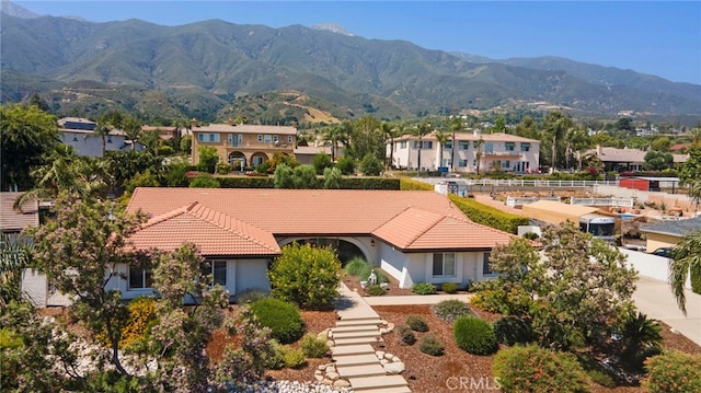 9430 Valley View St, Rancho Cucamonga, CA 91737 - view of front facade with a mountain view, a tile roof, stucco siding, and stairs