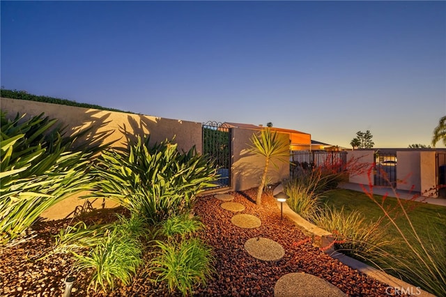 9430 Valley View St, Rancho Cucamonga, CA 91737 - yard at dusk featuring a gate