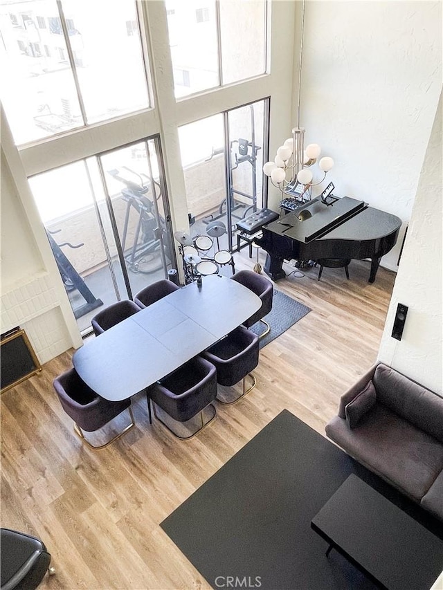 5310 Zelzah Ave Unit 312, Encino, CA 91316 - dining area featuring plenty of natural light and wood finished floors