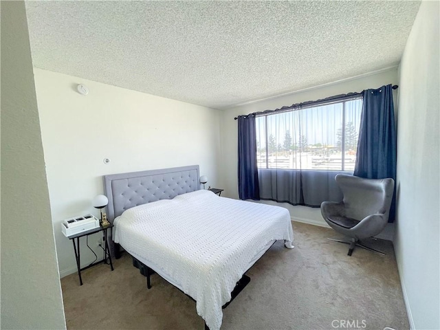 5310 Zelzah Ave Unit 312, Encino, CA 91316 - bedroom featuring carpet flooring and a textured ceiling
