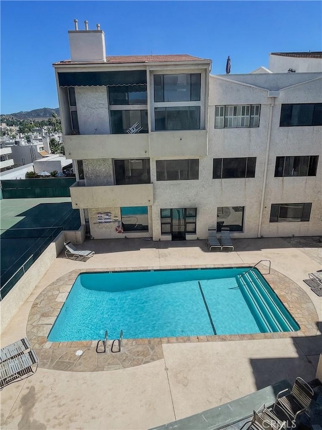 5310 Zelzah Ave Unit 312, Encino, CA 91316 - community pool with a patio area