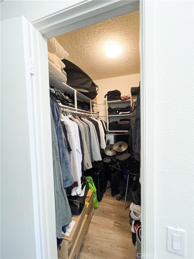 5310 Zelzah Ave Unit 312, Encino, CA 91316 - walk in closet featuring wood finished floors